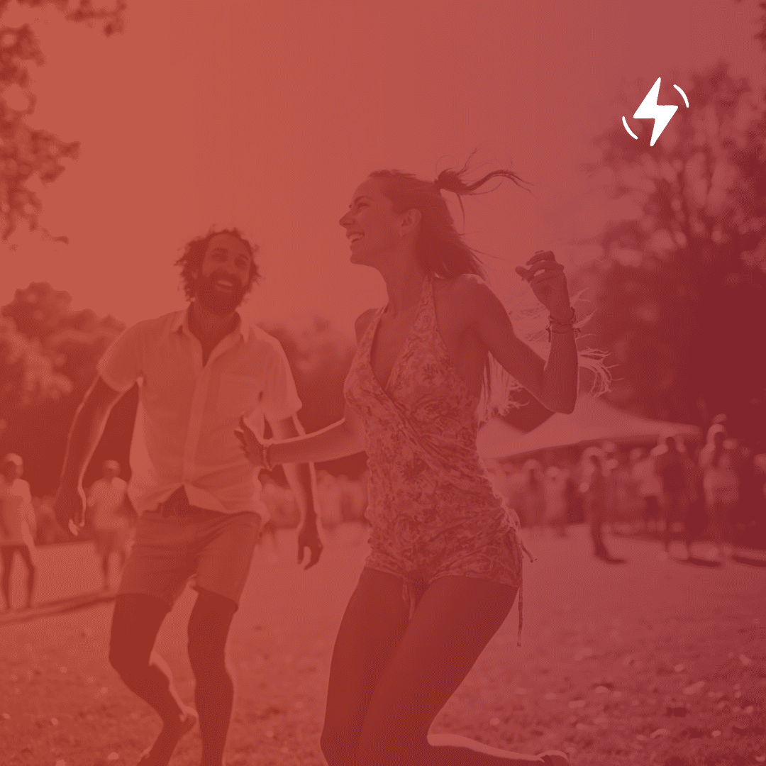 man and woman dancing on festival with colour gradient overlay showing the benefit of energy